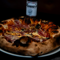 Pizza Proscutitto E Funghi - Nonnas Pizzeria