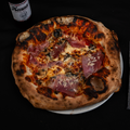 Pizza Proscutitto E Funghi - Nonnas Pizzeria