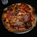 Pizza Proscutitto E Funghi - Nonnas Pizzeria