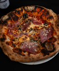 Pizza Proscutitto E Funghi - Nonnas Pizzeria